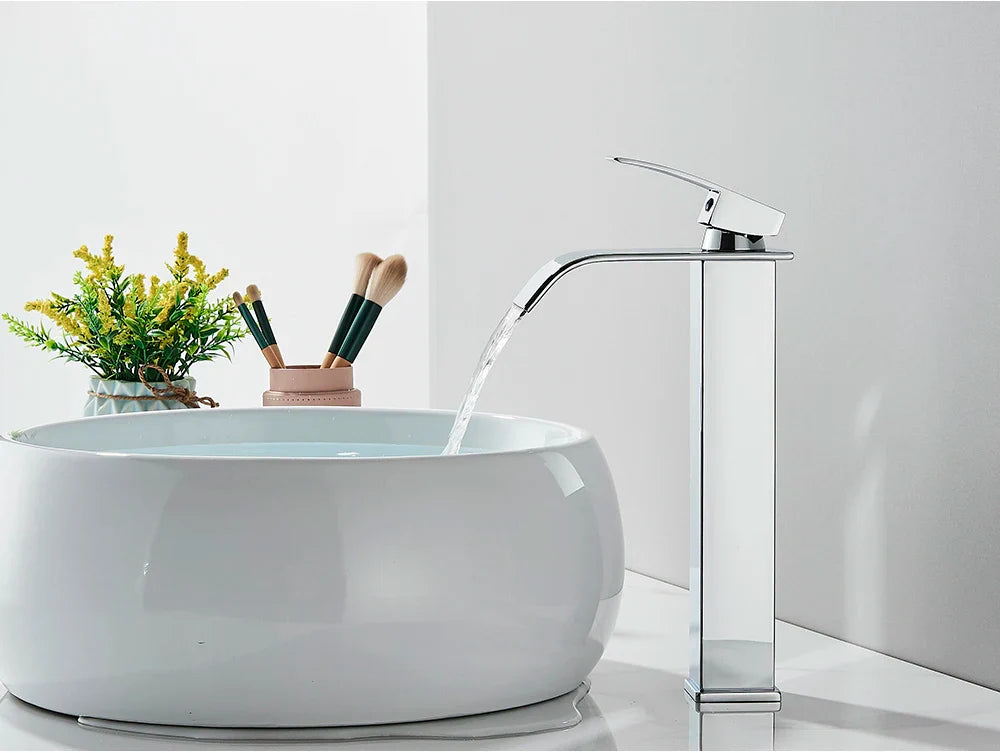 Modern chrome finished stainless steel bathroom sink faucet brass deck mount with sleek tall waterfall design