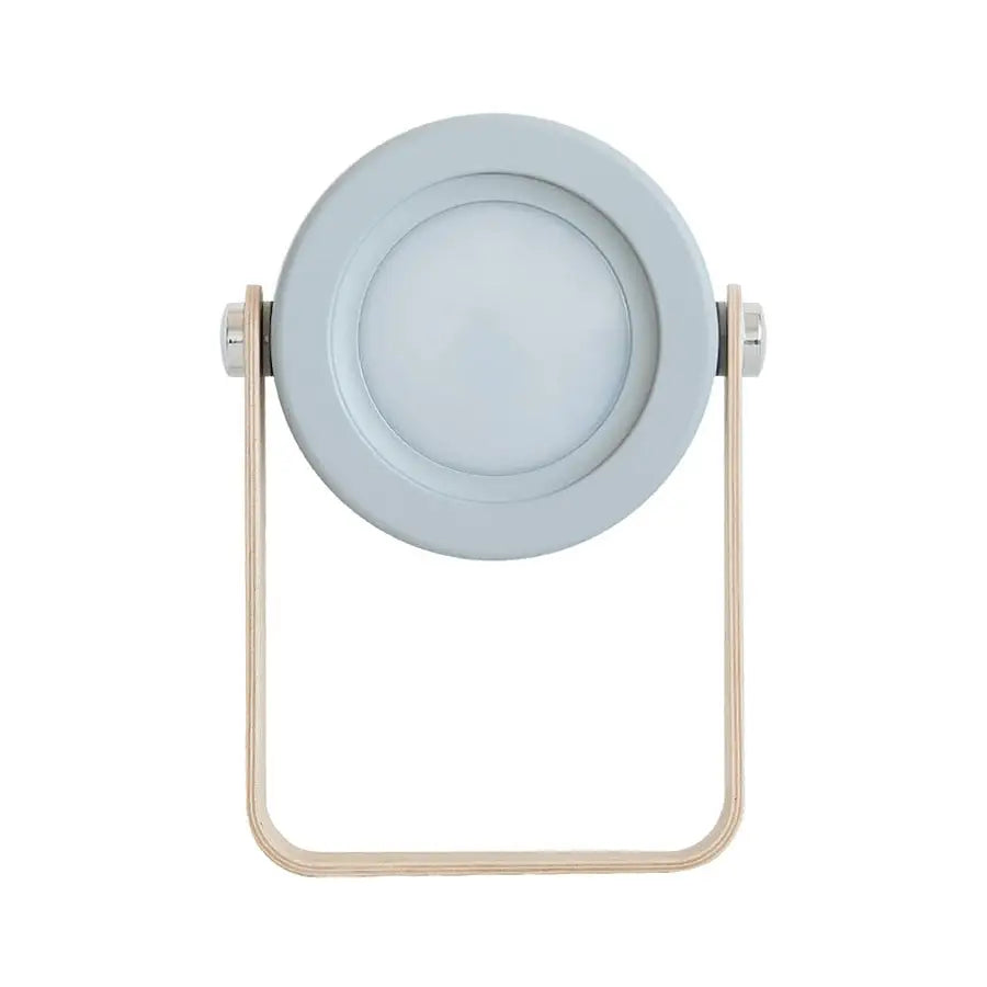 Light gray circular battery-operated wall sconce lantern with minimalist wooden frame and metallic accents