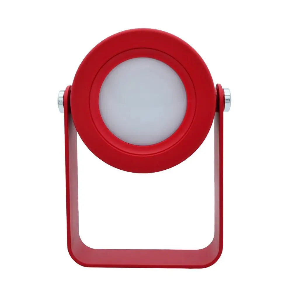 Battery-operated wall sconce lantern featuring a red circular led lamp with matte finish and silver metallic hinges