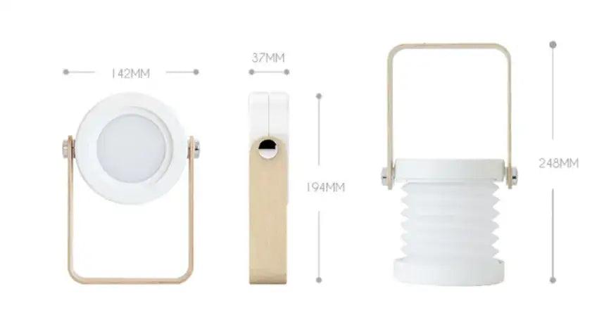 White collapsible battery-operated wall sconce lantern with light and wooden handle for versatile wall lighting