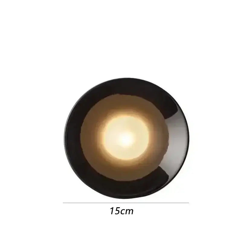 Circular black ceramic bowl with glossy finish 15cm diameter featured in bauhaus black and white metal wall lamp living room led sconce