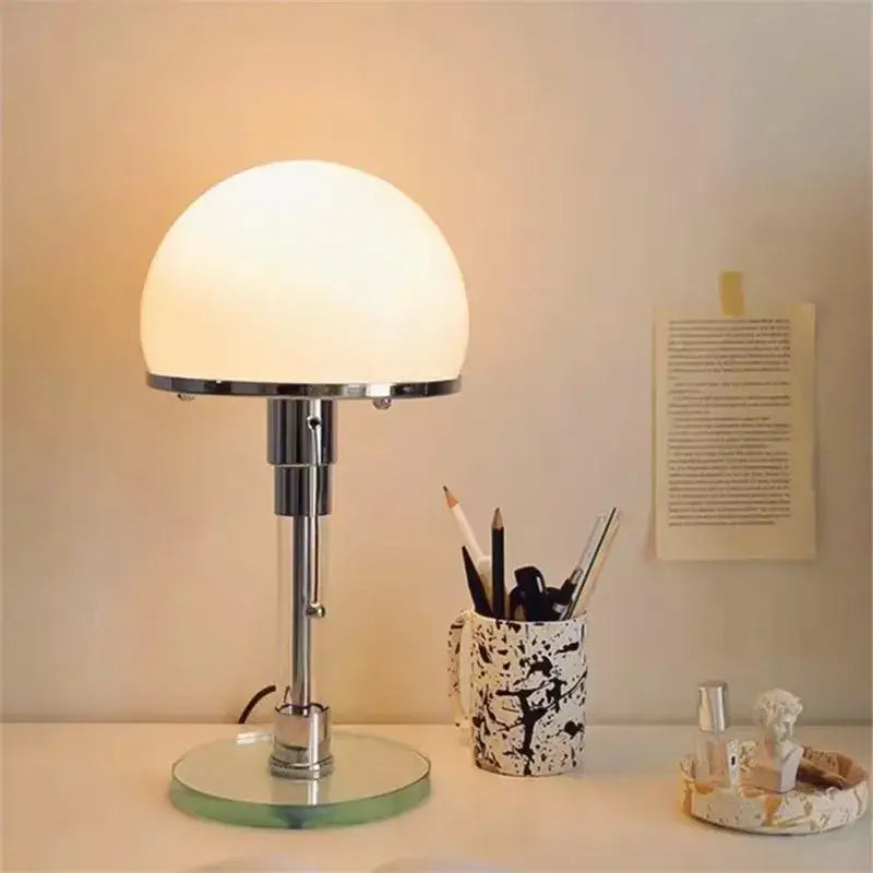 Bauhaus chrome table lamp with milk white glass dome shade and circular mirrored base for bedroom lighting