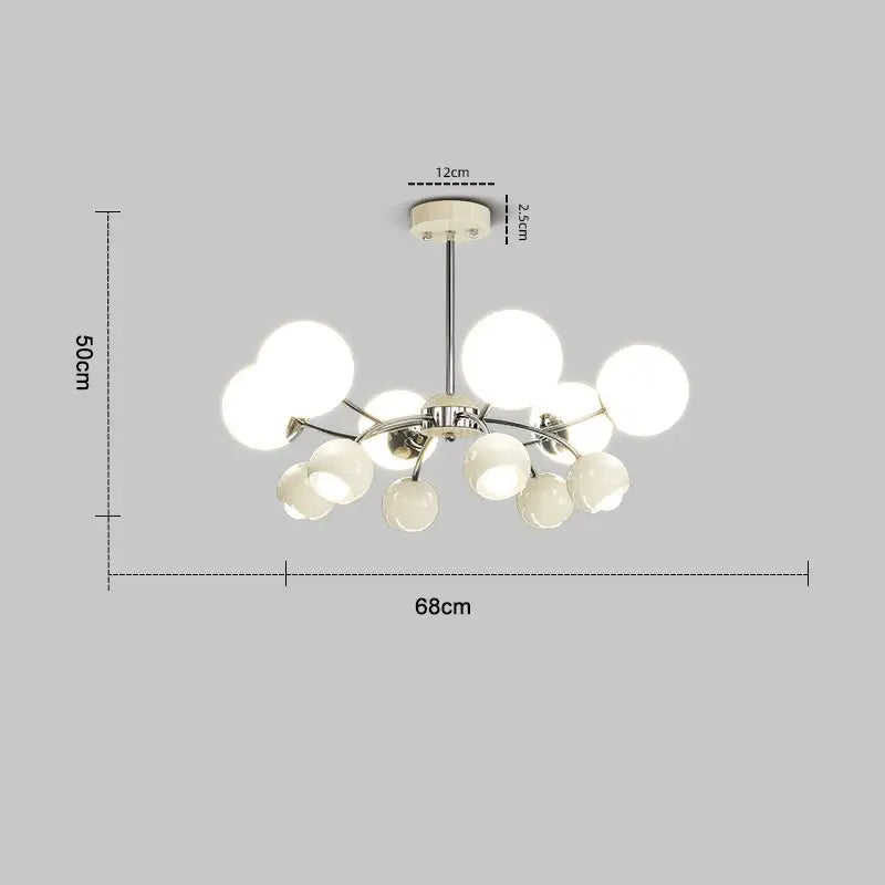 Modern chrome finished lasha pendant light with frosted glass globes in orange and white for dining room use
