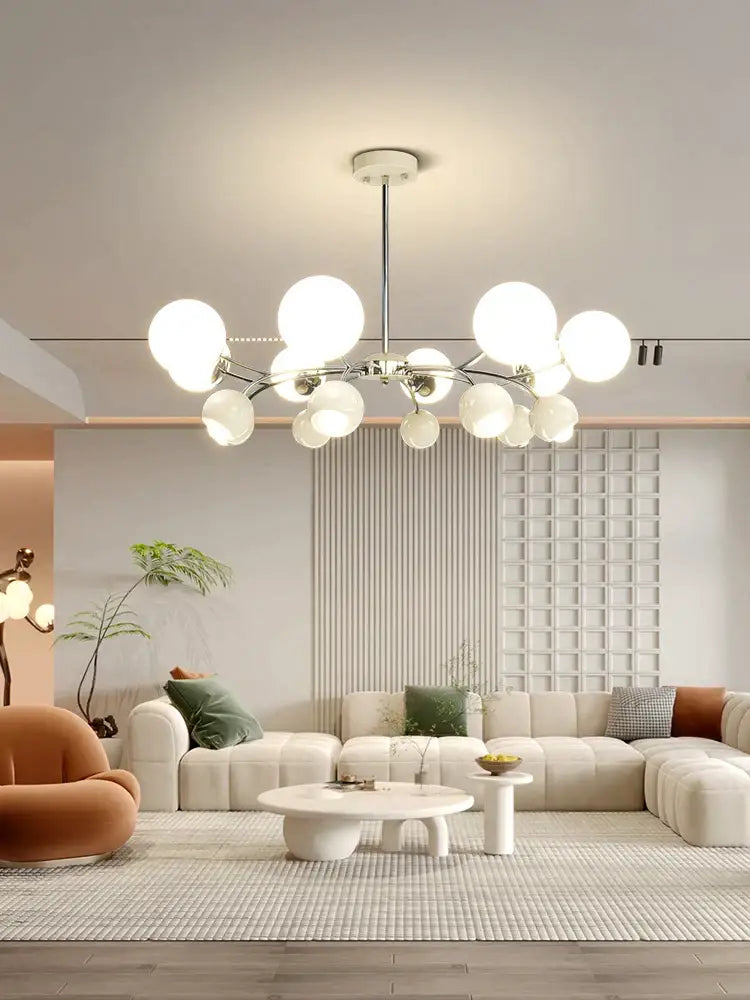 Modern white globe lasha pendant light with sleek chrome rod and branching arms for dining room lighting