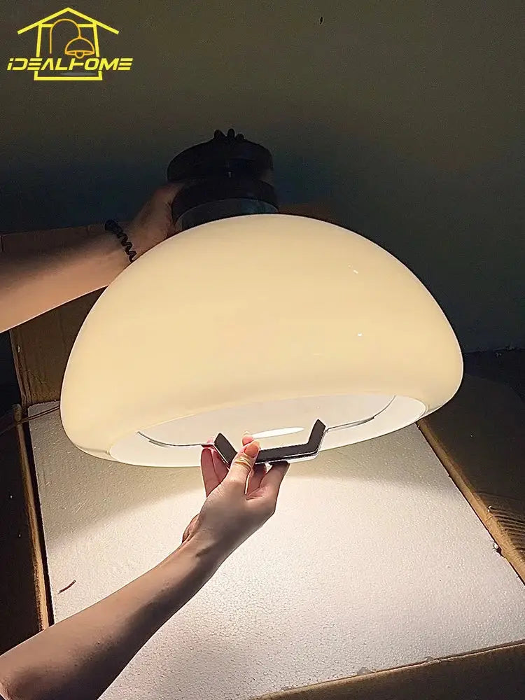 Bauhaus cream glass pendant light with dome-shaped cream glass and black metal fixture ideal for dining room decorbites pendant lights