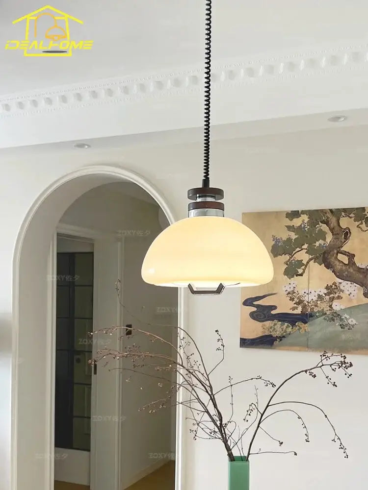 Bauhaus cream glass pendant light with dome shape and dark metal fixture ideal for dining room pendant lights decorbites cream glass