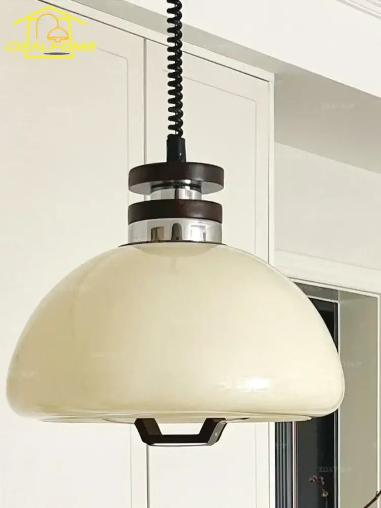 Bauhaus cream glass pendant light with dome shape black coiled cord and metallic accents ideal for kitchen decorbites pendant lights