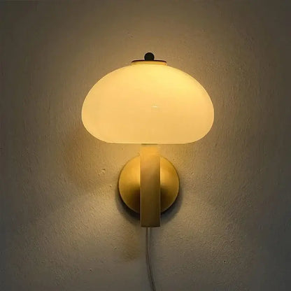 Warm-toned decorbites cream mushroom wall light with frosted cream mushroom glass and brass-finished metal base