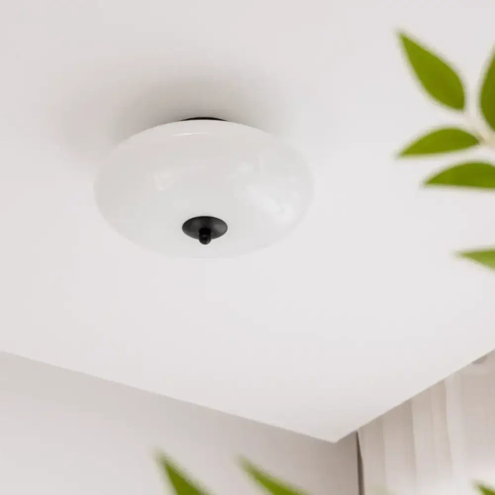 Cream white glass ceiling lamp with white frosted glass and black central fixture for dining room decorbites cream white