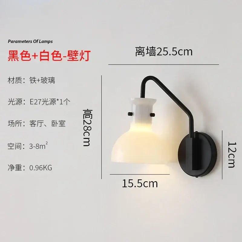 Black and white Bauhaus glass led wall lamp with curved metal arm and frosted glass shade for bedroom use