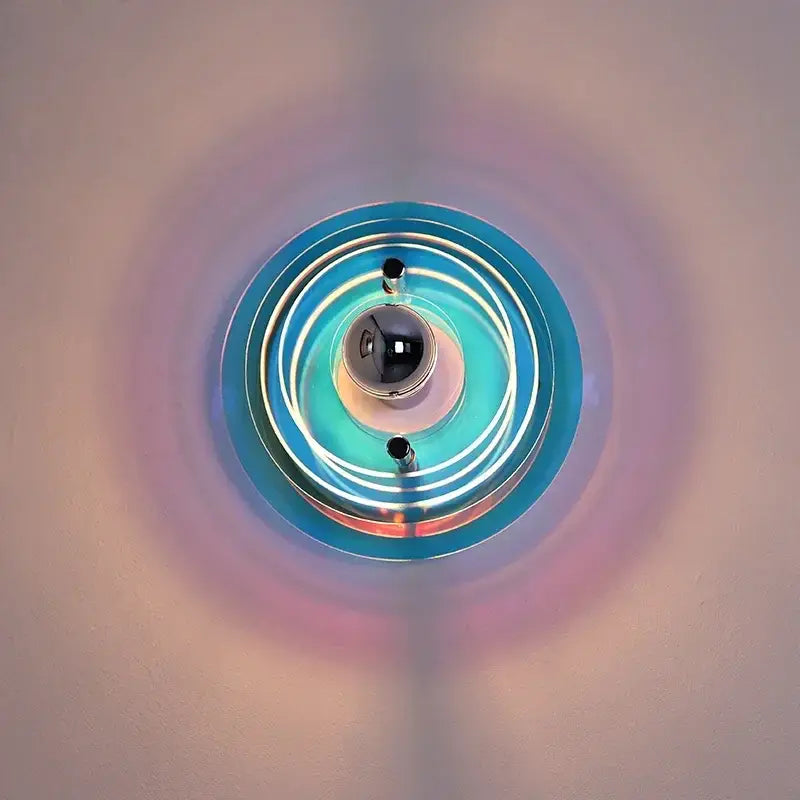 Bauhaus green and clear glass led wall sconces with circular blue and white layers and central black bulb decorbites led wall light