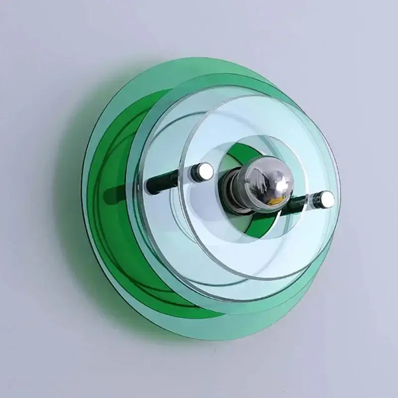 A modern bauhaus green and clear glass led wall sconces with concentric rings and chrome bulb holder for bedroom decorbites led wall