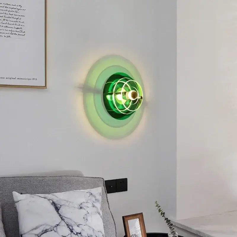 Bauhaus green and clear glass led wall sconces with circular layered design and brass accents for bedroom decorbites led wall lighting