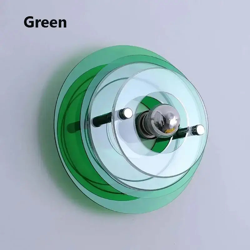 Bauhaus green and clear glass led wall sconces featuring concentric circular layers and a chrome bulb holder for bedroom decorbites led wall lighting