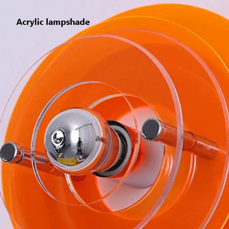 Vibrant orange acrylic lampshade with clear circular rings and chrome bulb holder in bauhaus green and clear glass led wall sconces decorbites led wall