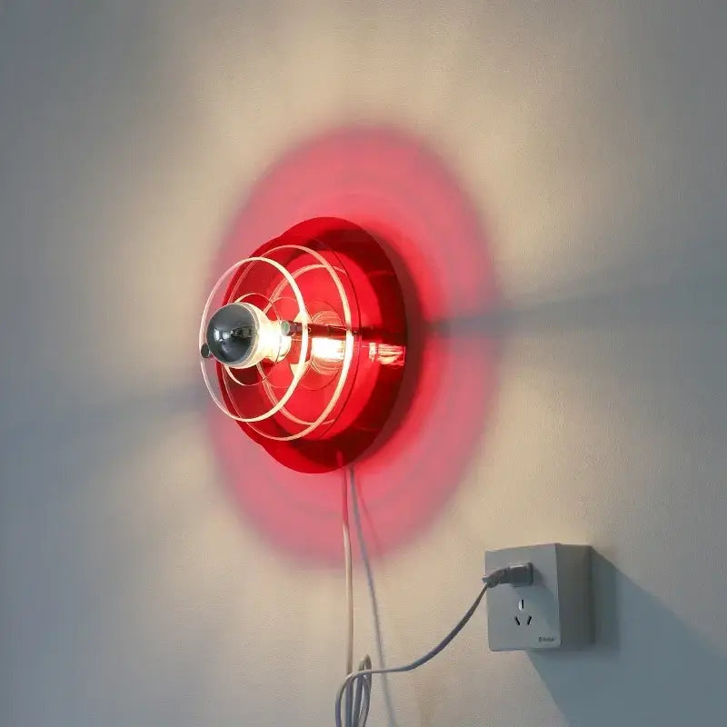 Vibrant red circular wall sconce with clear protective cage led wall sconces ideal for bedroom decorbites led wall lighting