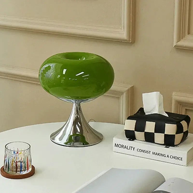 Bauhaus green glass led table lamp with vibrant glossy finish and sleek chrome pedestal base for living room use