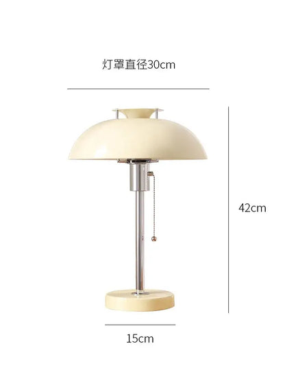 Cream-colored dome-shaped lampshade bauhaus led table lamp with sleek chrome stem and base for bedroom or living room