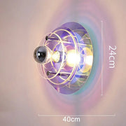 Bauhaus modern acrylic ufo led wall lamp with transparent globe and metallic rings for living room decorbites led wall lamp