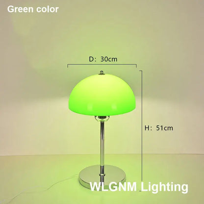 A bauhaus mushroom table lamp with a vibrant green dome shade and polished chrome base for bedroom night light
