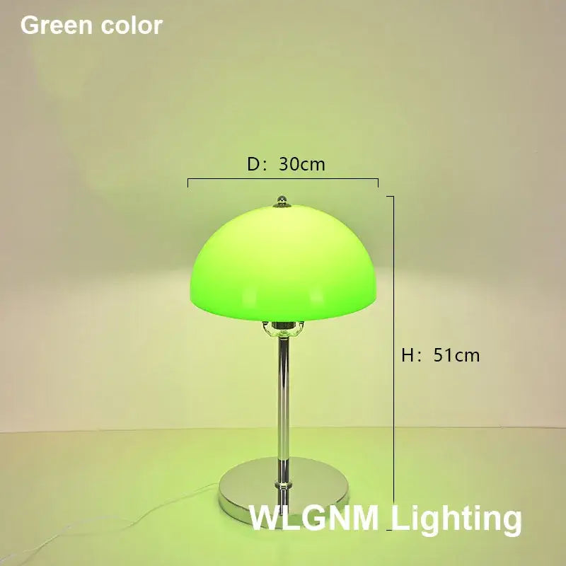A bauhaus mushroom table lamp with a vibrant green dome shade and polished chrome base for bedroom night light