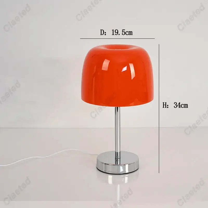 Vibrant orange glossy acrylic bauhaus retro table lamp with chrome base for bedroom use