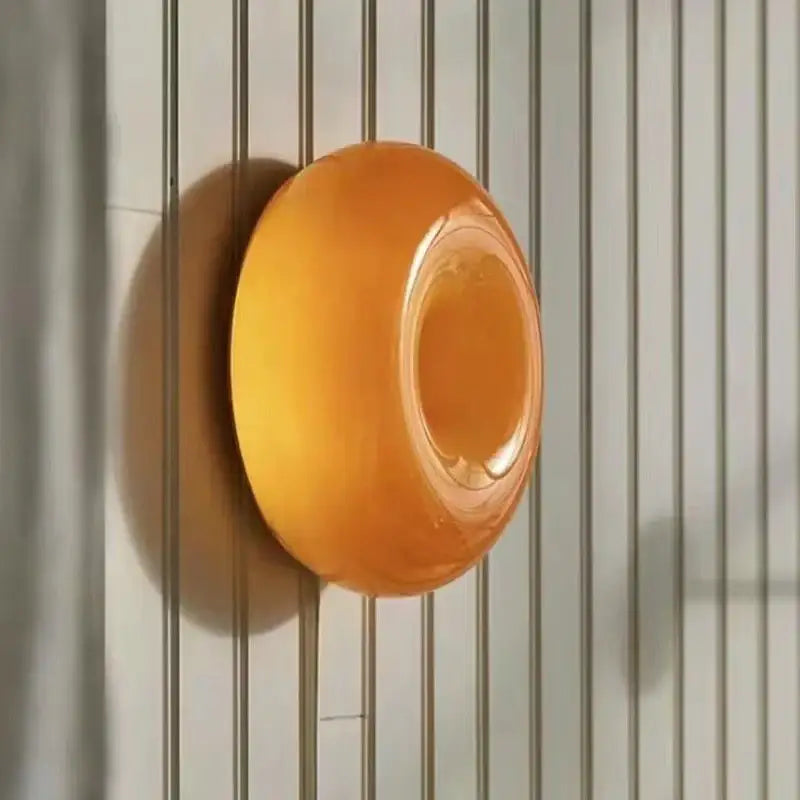 Orange translucent silicone soap dish with smooth rounded design inspired by bauhaus orange glass style bedroom accessory