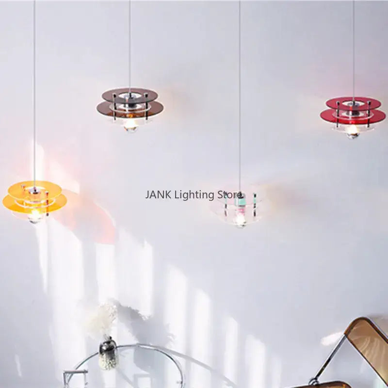 Modern bauhaus ph ufo pendant acrylic chandelier with circular layered shades in vibrant yellow red and brown tones for dining room