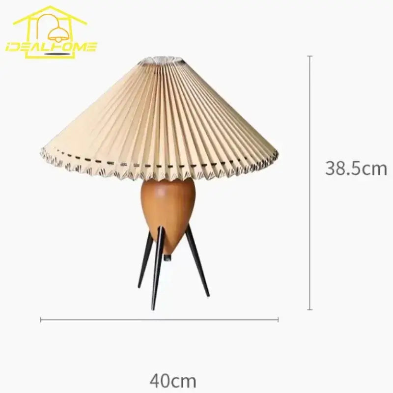Beige bauhaus pleated wood table lamp with wooden base and black metal tripod legs for bedroom desk lighting