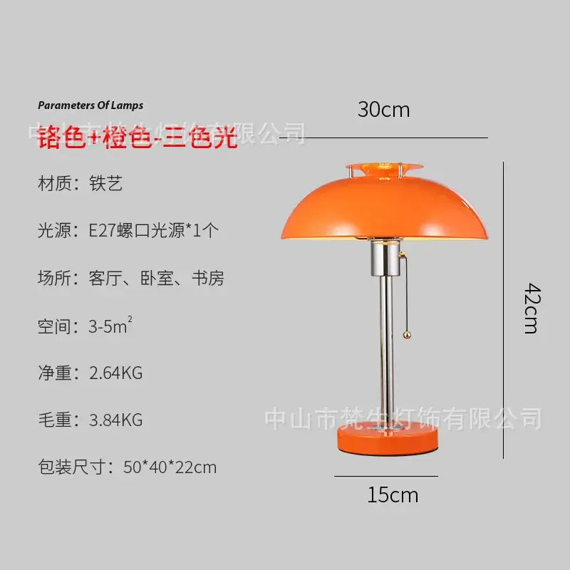 Vibrant orange bauhaus led table lamp with glossy ceramic dome and metallic base featuring e27 bulb socket for bedroom use