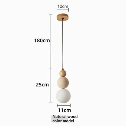 Minimalist pendant light with three stacked natural wood and matte white shades suspended from wooden ceiling mount works beautifully