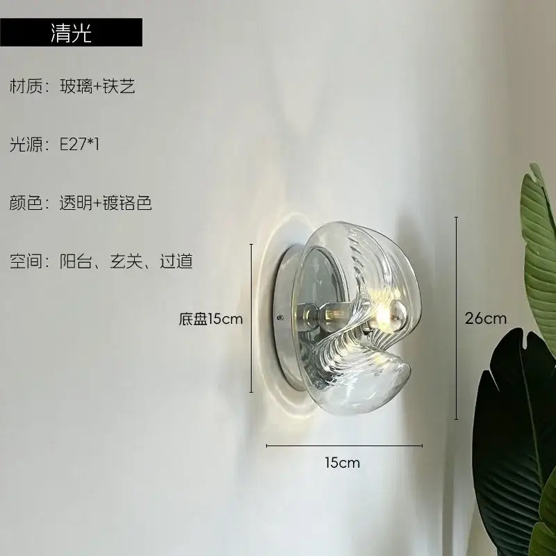 Modern bauhaus wavy glass wall lamp with clear glass and chrome metal in elegant spiral design for bedroom lighting
