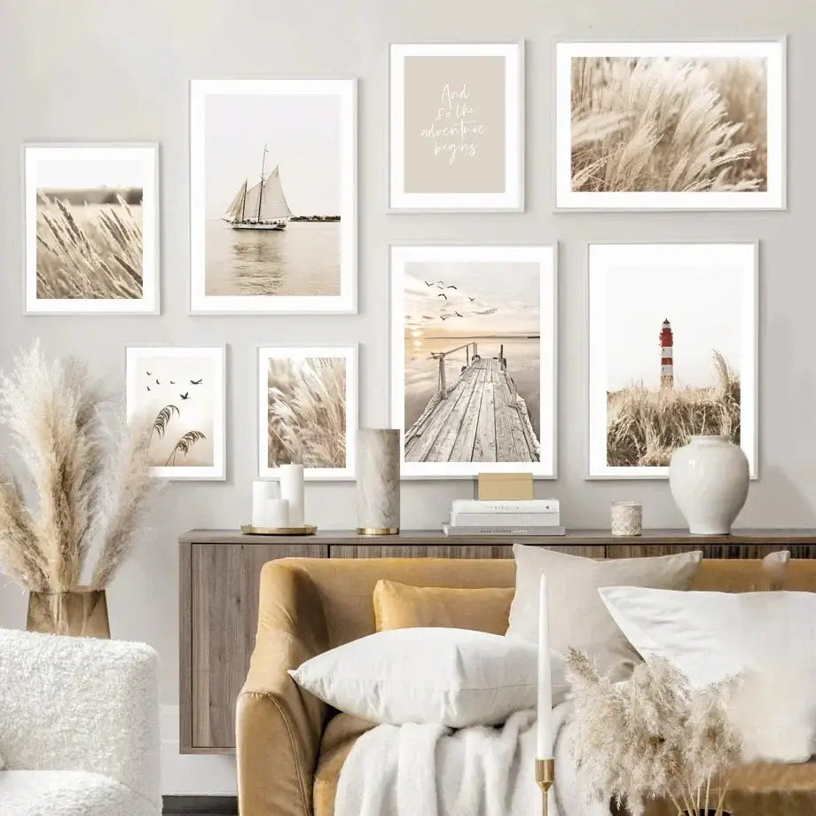 A collection of nine white framed bohemia beach wall art pieces featuring coastal nature scenes in beige neutral tones for home decor