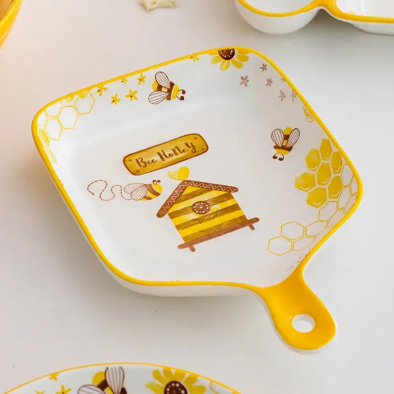 Yellow and white bee ceramic plate with honeycomb design and handle for easy carrying kitchen use tray