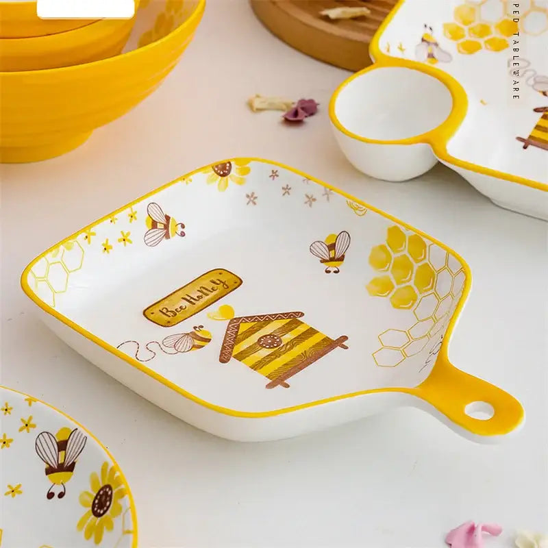 White ceramic bee ceramic plate with yellow honeycomb handle and bee happy design for kitchen use