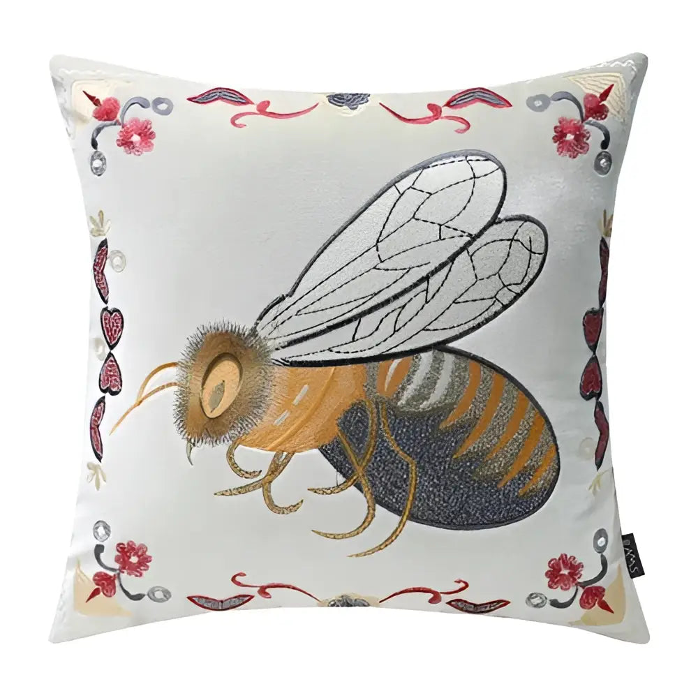 Decorative square cushion cover with bee embroidery featuring golden and black stripes on light silver fabric for living room decor