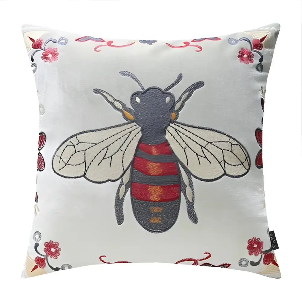 Square cushion cover with bee embroidery and floral motifs on light gray fabric for yellow green and blue living room decor