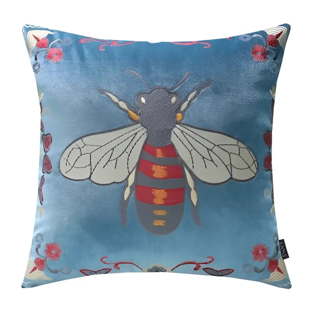 Blue velvet cushion cover with detailed bee embroidery and floral motifs for yellow green and blue living room decor