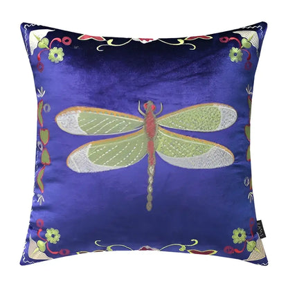 A royal blue velvet cushion cover with green and silver embroidered dragonfly and floral accents for living room decor