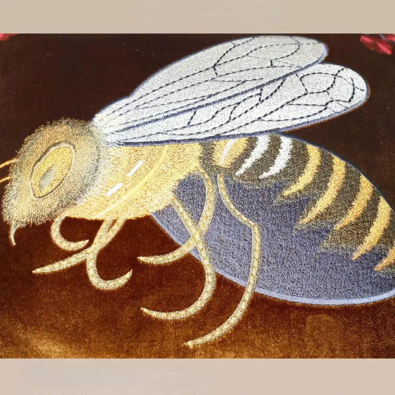 Bee embroidery cushion cover with golden black bee and silver wings on brown velvet for living room decor