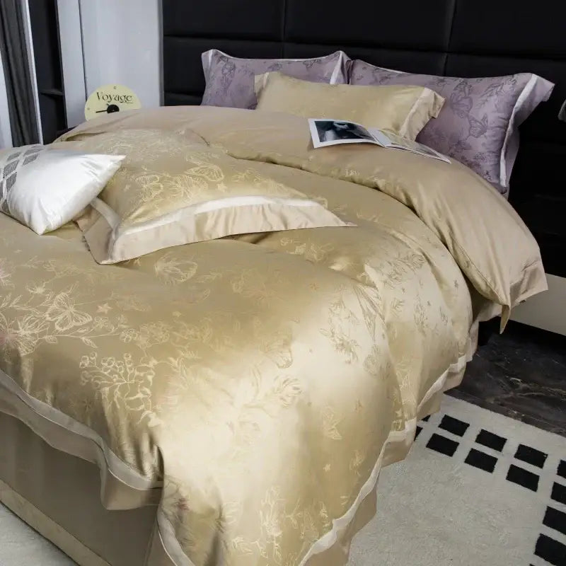 Luxurious beige and gold butterfly lyocell cotton bedding set with intricate floral embroidery and matching pillowcases