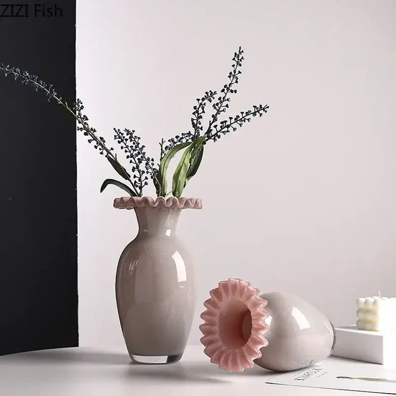 A sleek matte gray ceramic vase with a pink flower edge and slender neck for living room decor with tray