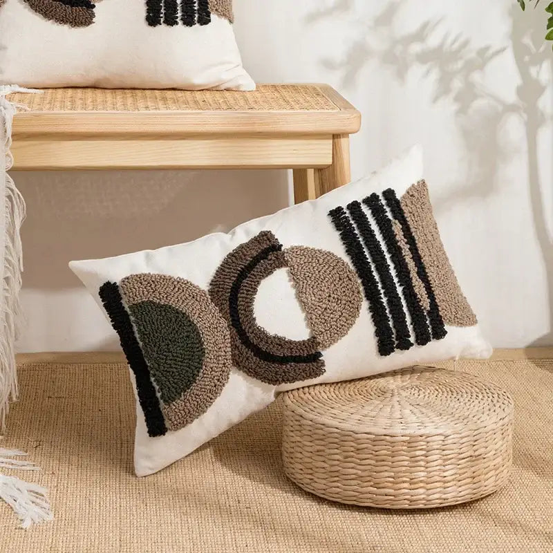 White rectangular cushion cover with beige and white geometric embroidery tassel in decorbites geometric embroidery style
