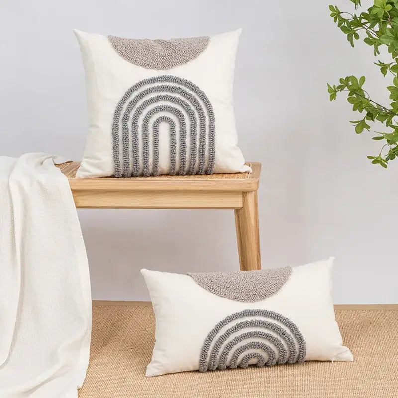 Beige and white cushion cover with cream base and textured gray rainbow geometric embroidery tassel for living room decorbites