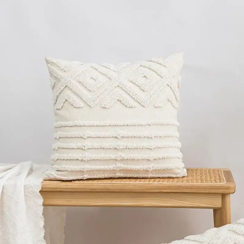Cream-colored cushion cover with beige and white geometric embroidery tassel decorbites design for living room decor