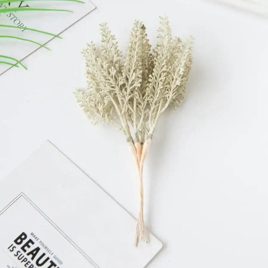 A delicate pale beige artificial plants bouquet with fine feathery fronds and slender stems for decorbites golden wheat ear decor