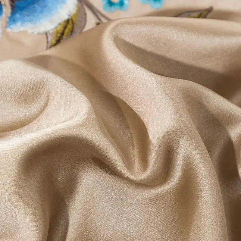 Beige and blue embroidered egyptian cotton bedding set with satin sheen and delicate floral embroidery for luxury bedroom