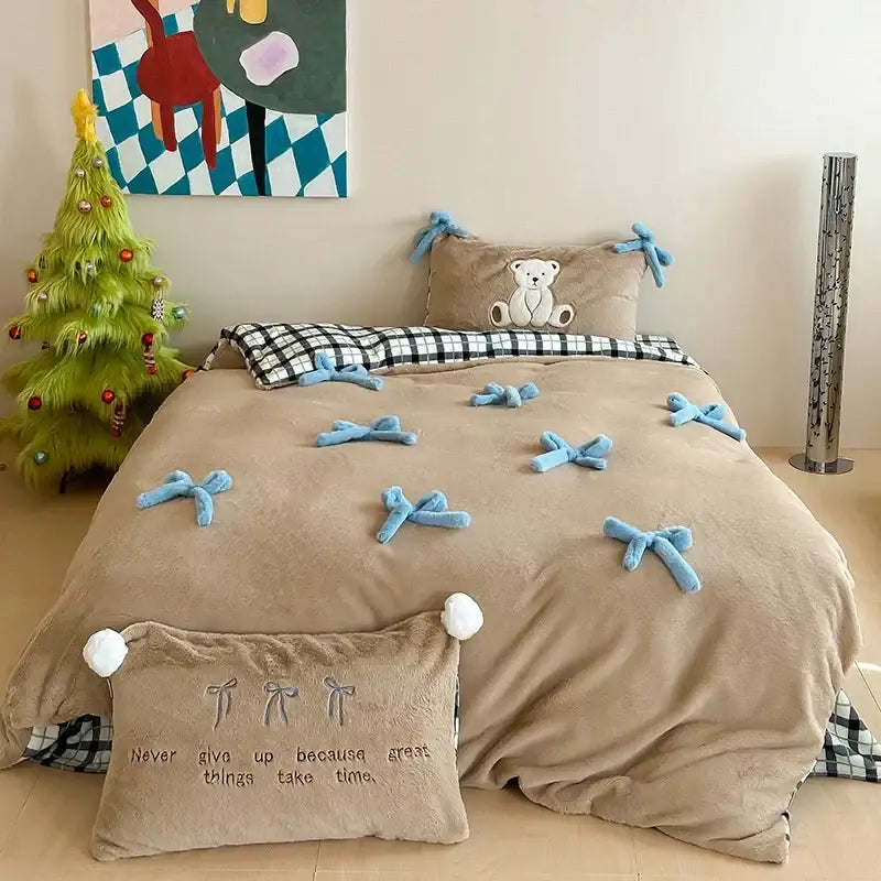 Beige and blue embroidered velvet duvet bedding set with plush fabric bows and motivational phrases for bedroom decor