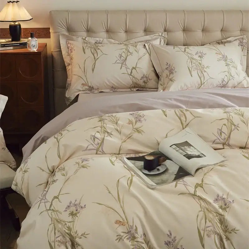 Beige and blush butterfly blooming flowers bedding set with delicate purple and green botanical prints on soft cotton fabric