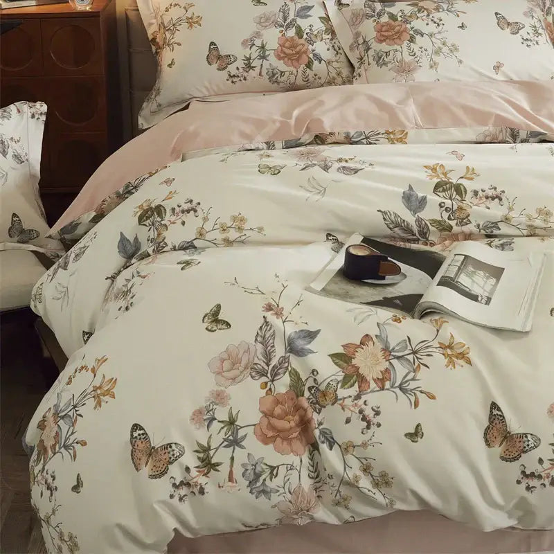 Beige and blush butterfly blooming flowers bedding set with cream floral satin fabric and delicate pink peach green blossoms